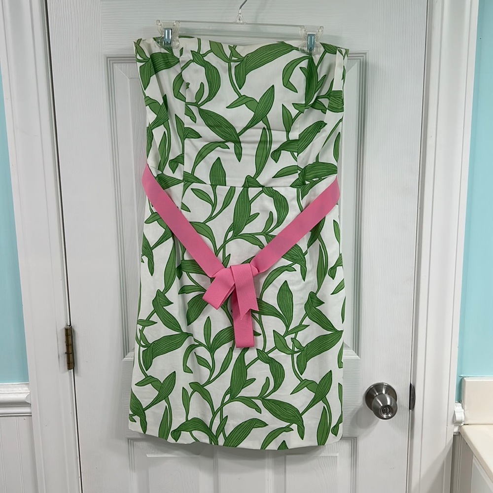 Gently used Molly B strapless dress with pink tie.  Size 12.